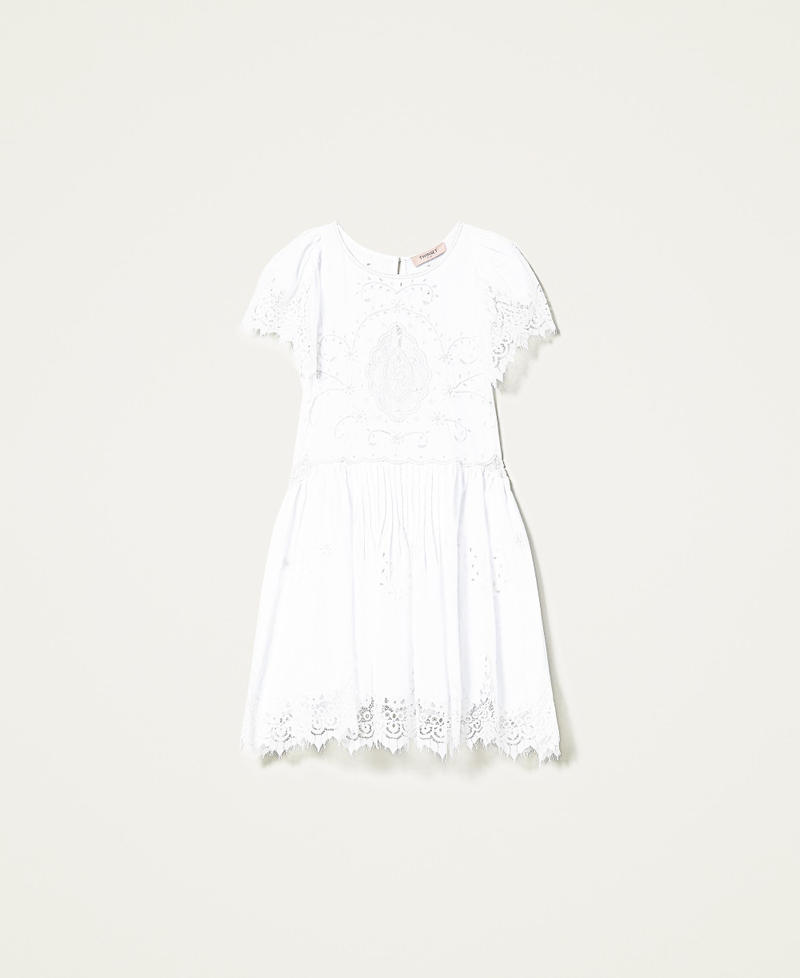 Hand-embroidered dress with inlaid lace