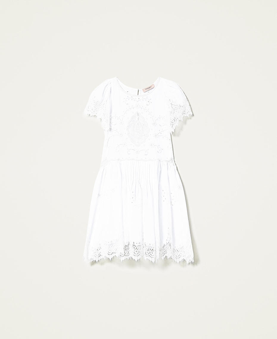 Hand-embroidered dress with inlaid lace