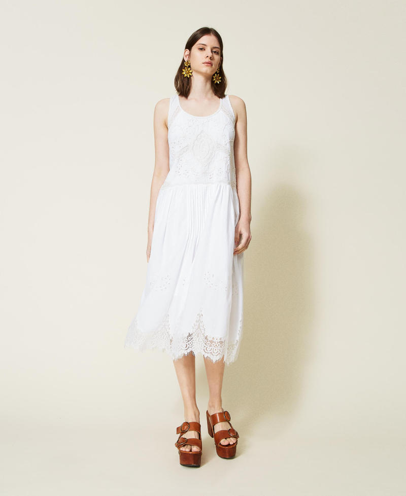 Hand-embroidered midi dress with lace