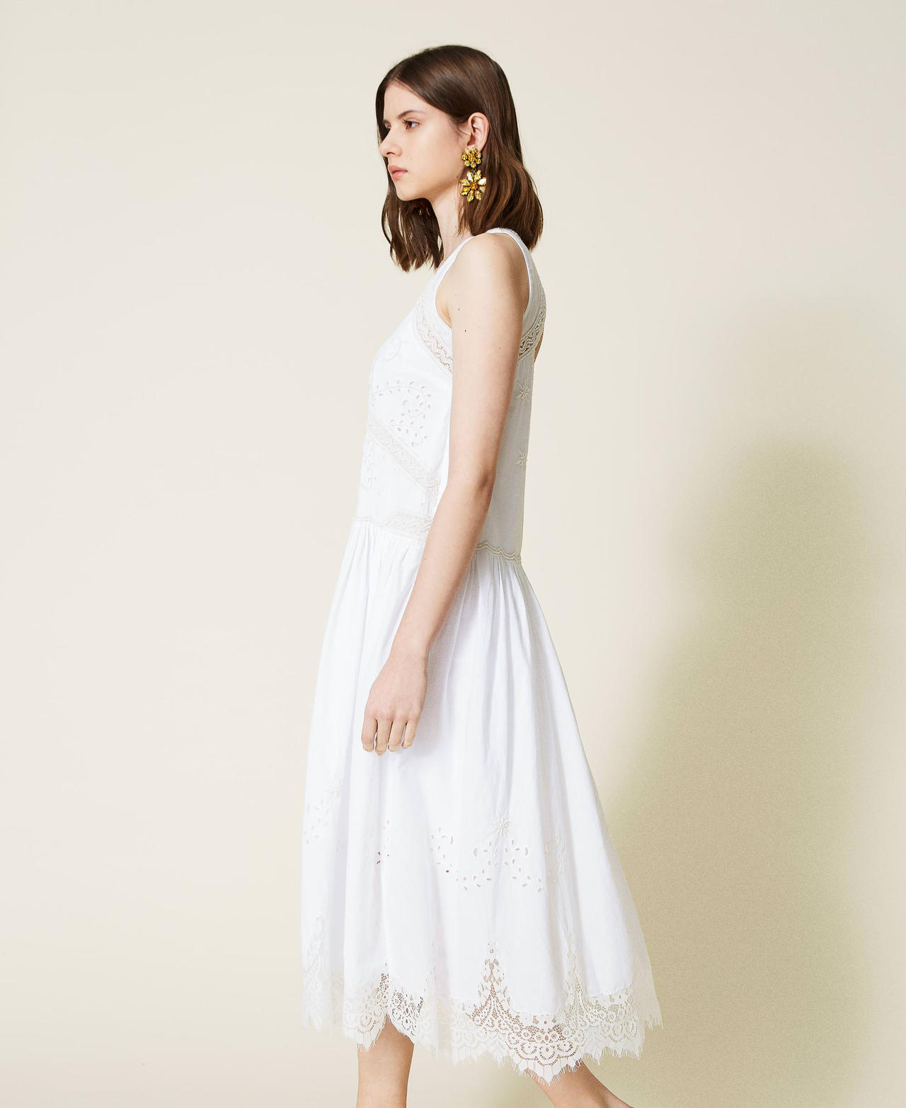 Hand-embroidered midi dress with lace