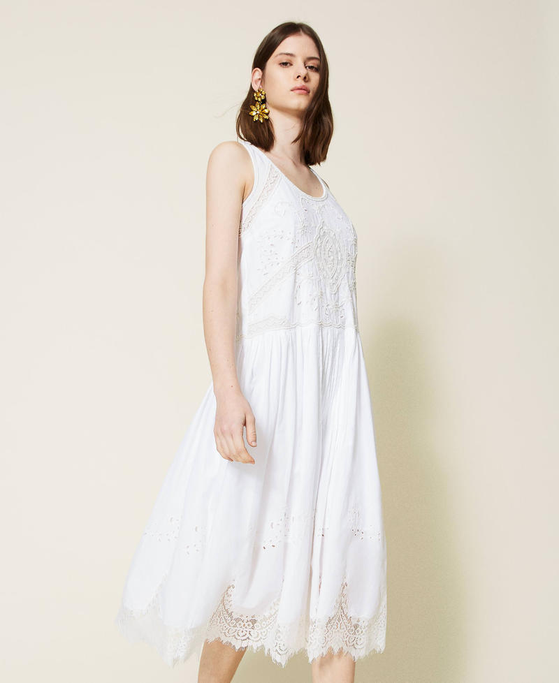 Hand-embroidered midi dress with lace