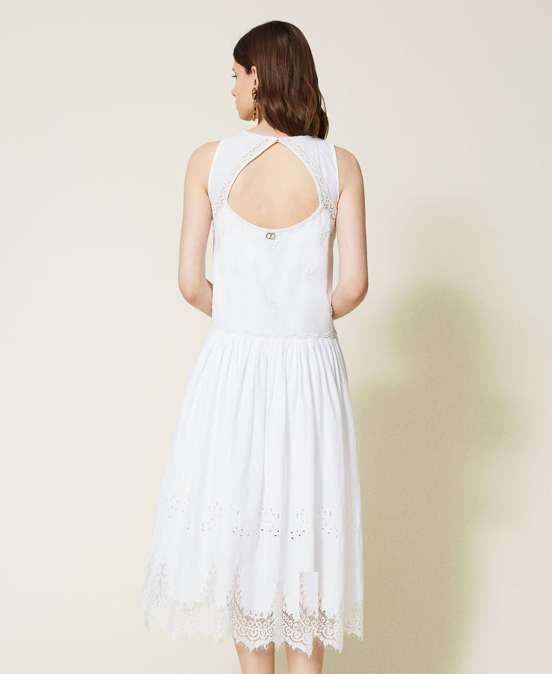 Hand-embroidered midi dress with lace