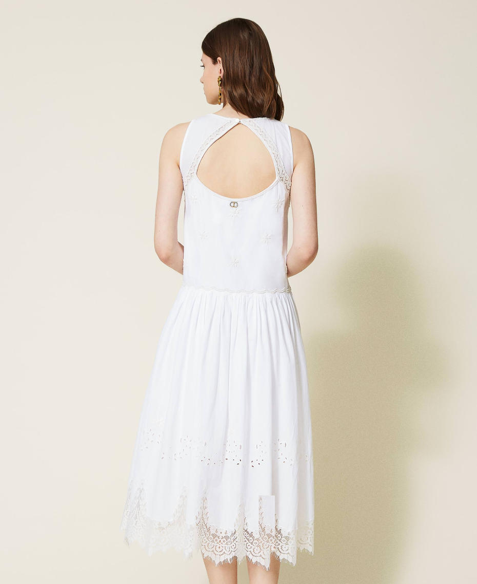 Hand-embroidered midi dress with lace