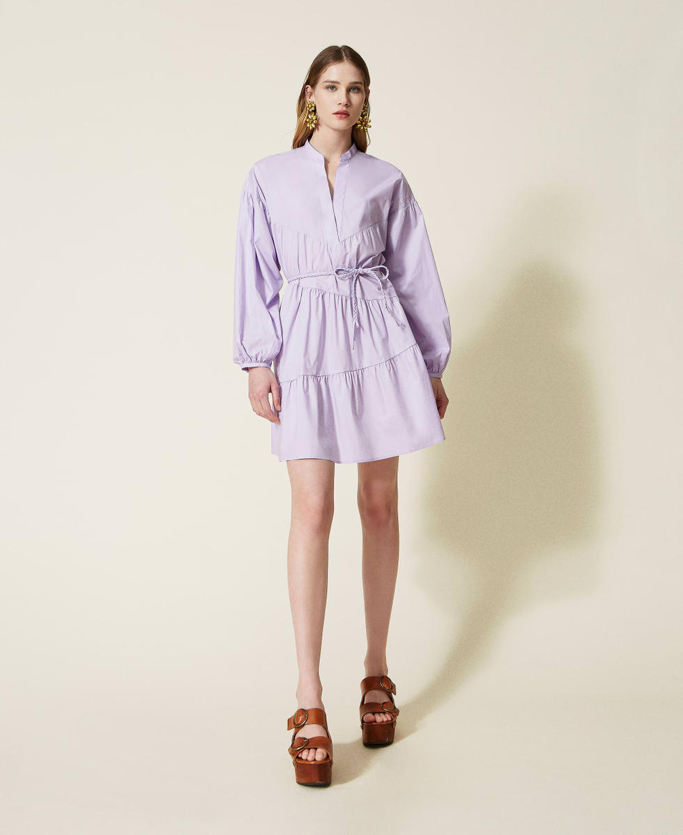 Dress with asymmetric flounces