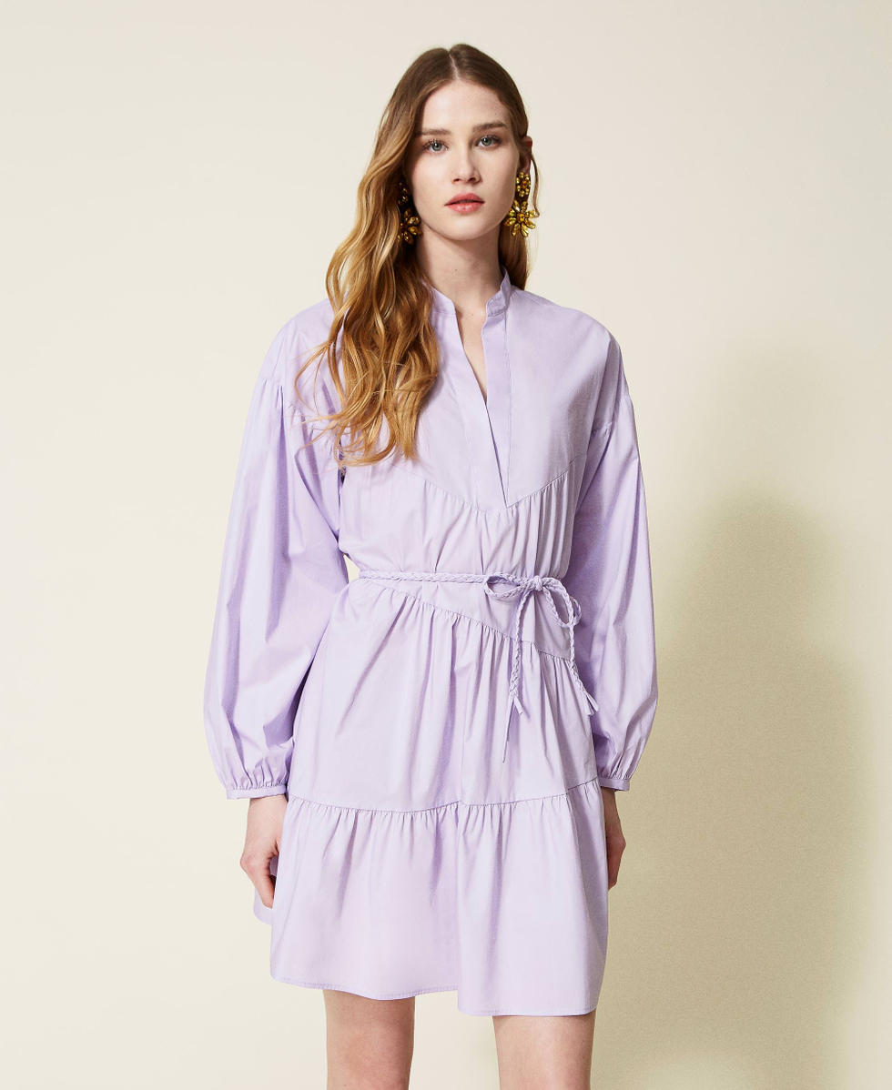 Dress with asymmetric flounces