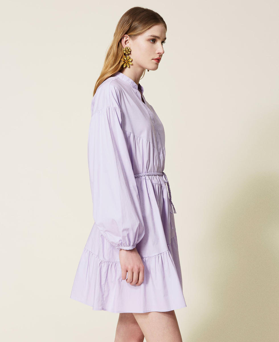 Dress with asymmetric flounces