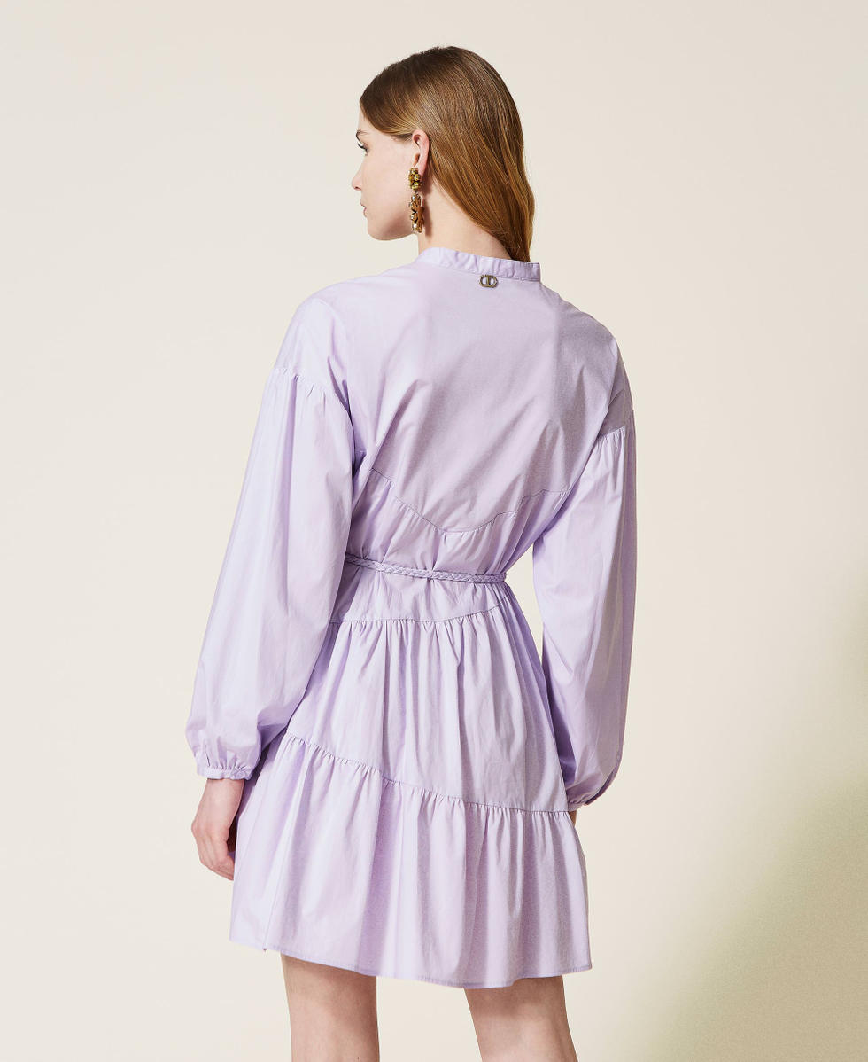 Dress with asymmetric flounces
