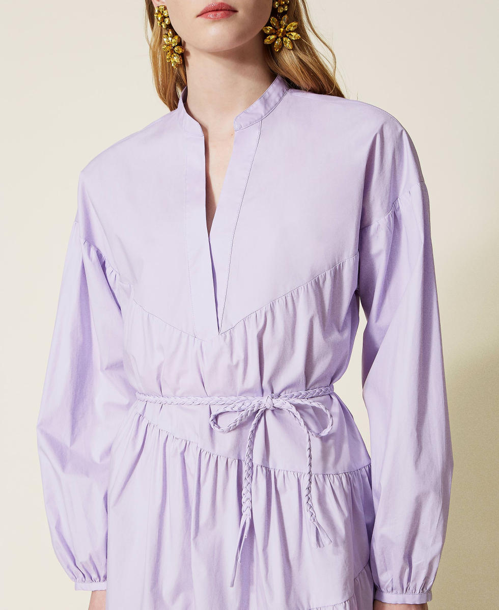 Dress with asymmetric flounces