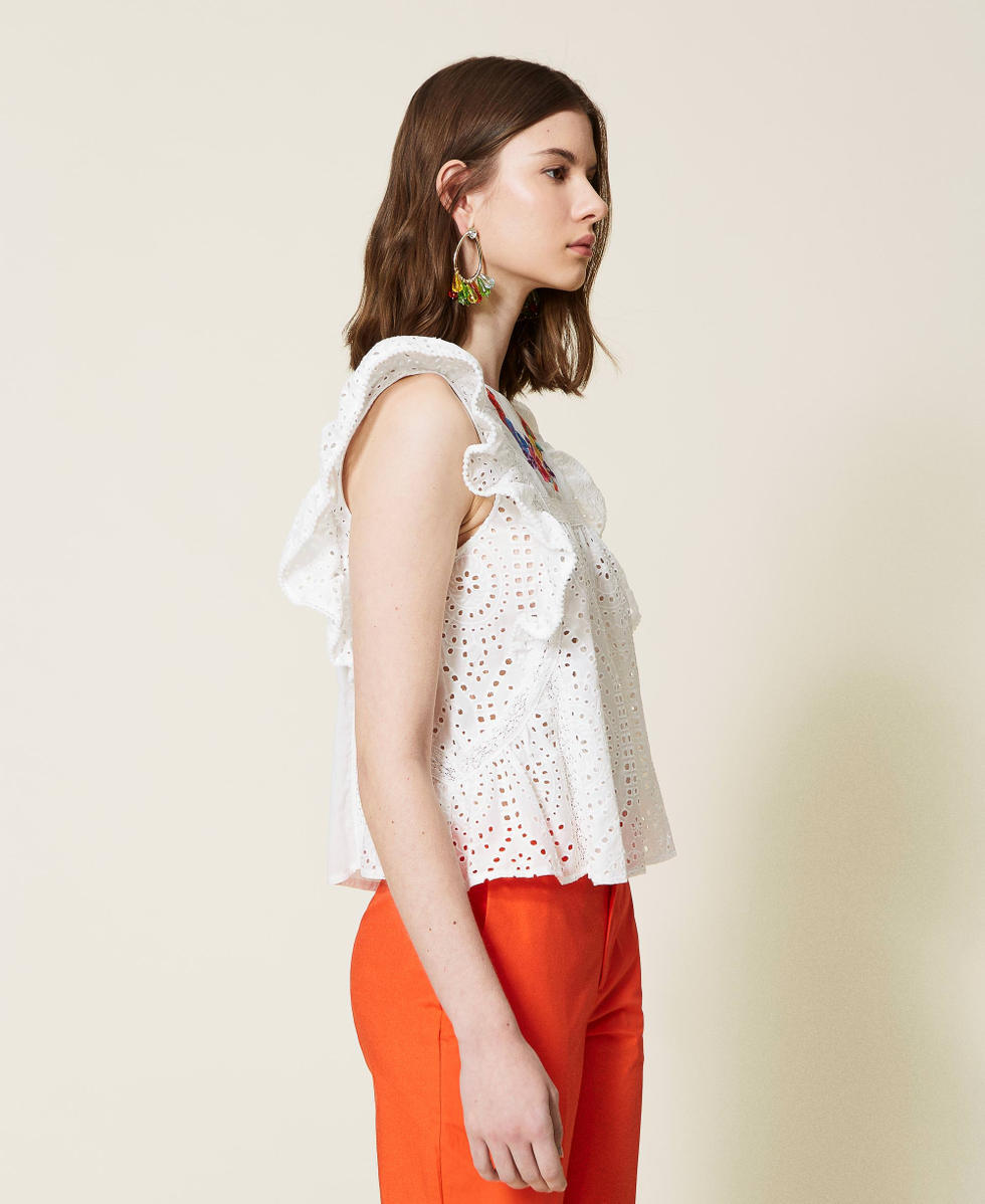 Top with multicolour floral embroidery