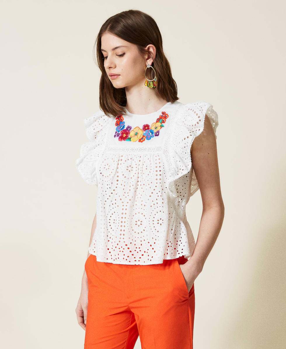 Top with multicolour floral embroidery