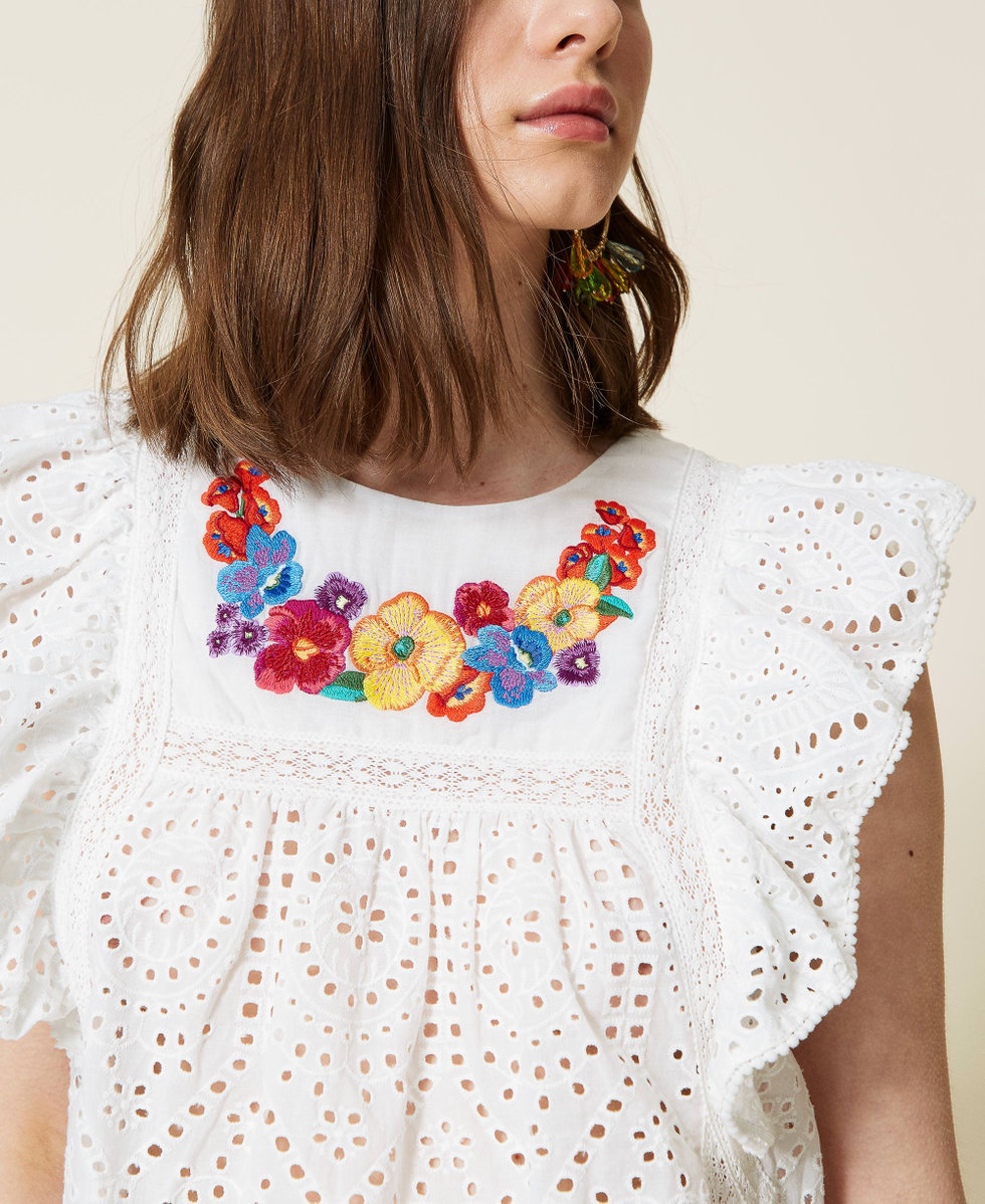 Top with multicolour floral embroidery