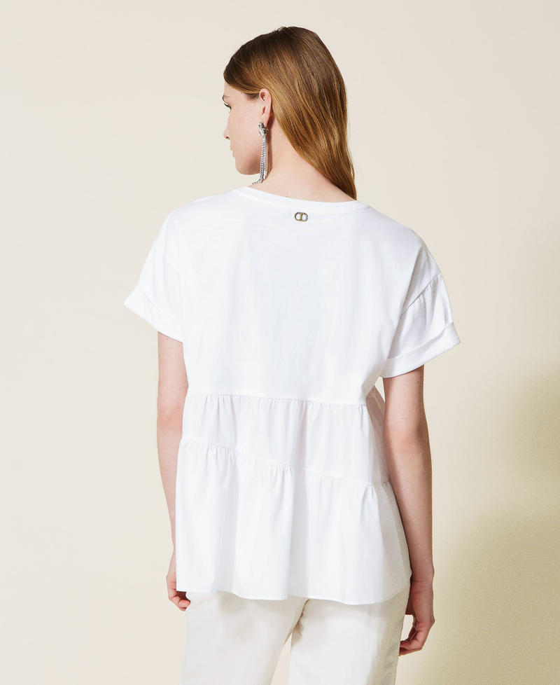 Asymmetric flounce blouse