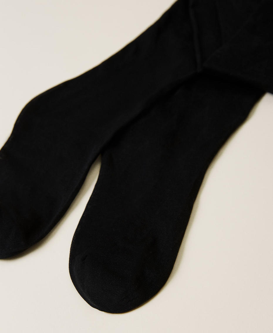 Halbtransparente Strumpfhose mit Logo