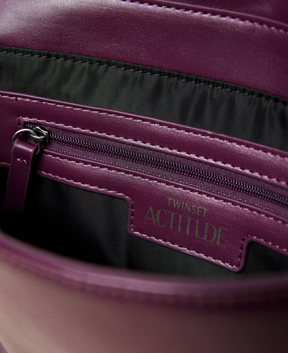 Cross-body bag with weave