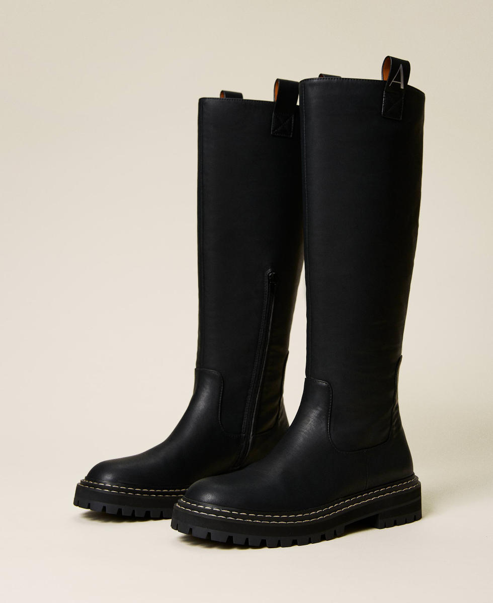 High leg boots with stitching and logo