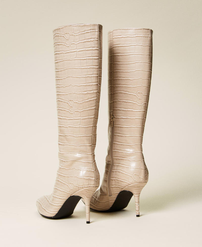 Crocodile print high boots