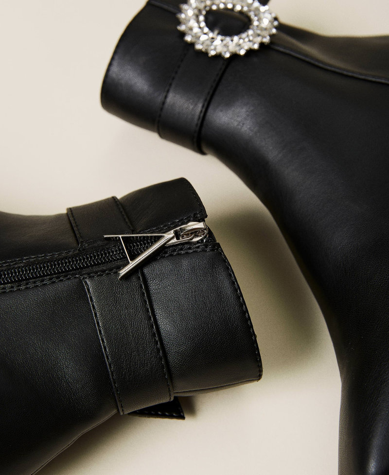 Ankle boots with strap and jewel buckle