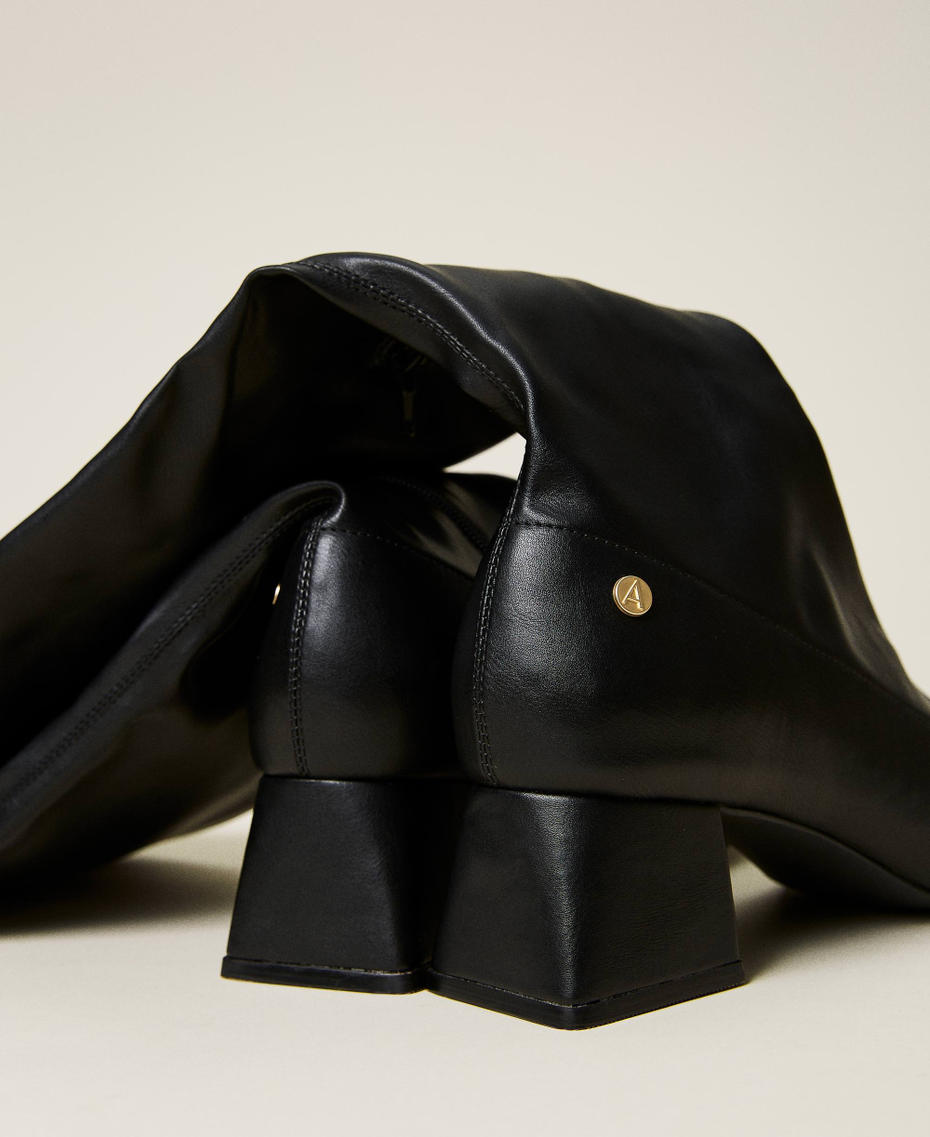 Leather-like thigh-high boots