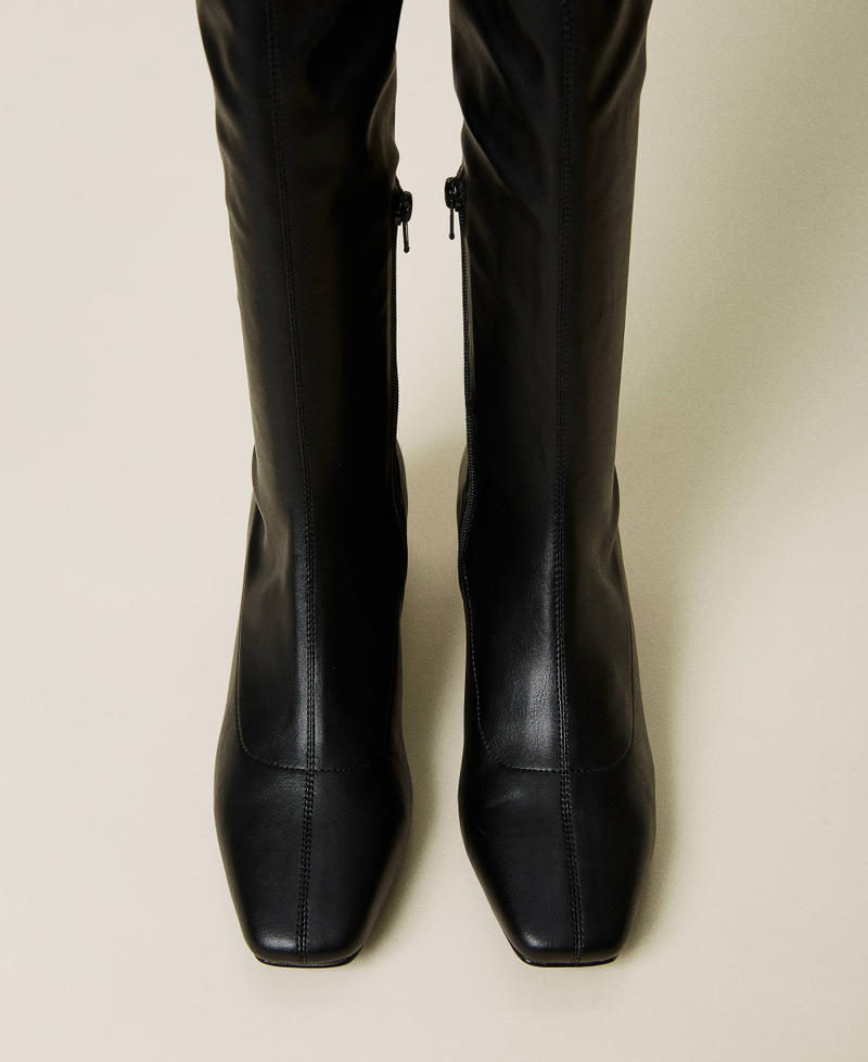 Leather-like thigh-high boots