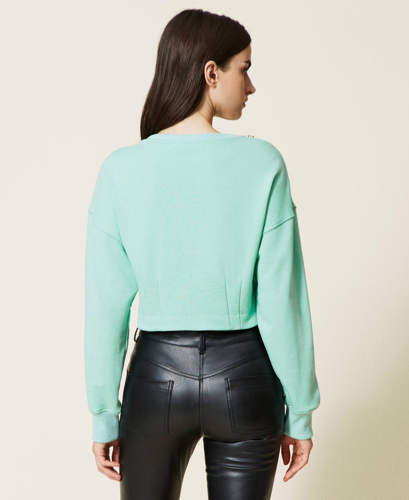 Short sweatshirt with handmade bezel embroidery