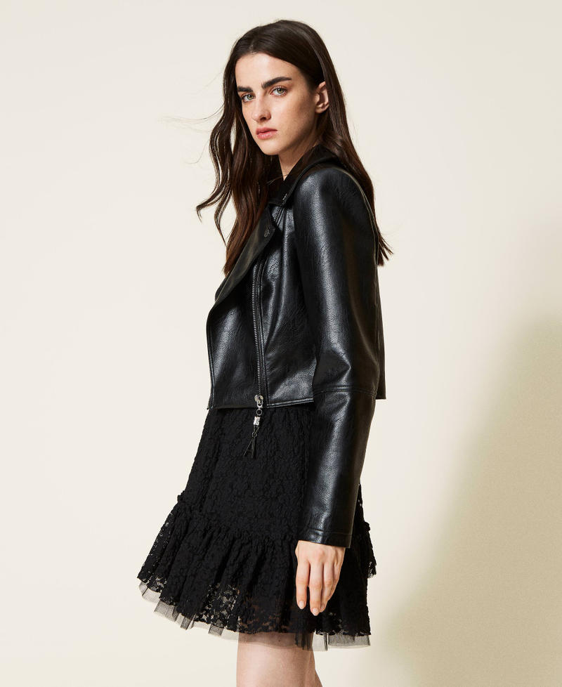 Biker jacket with logo puller