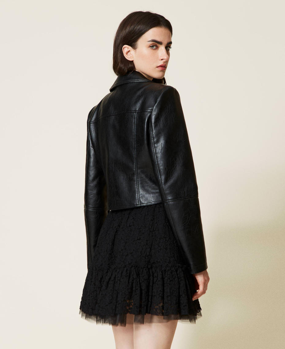 Biker jacket with logo puller