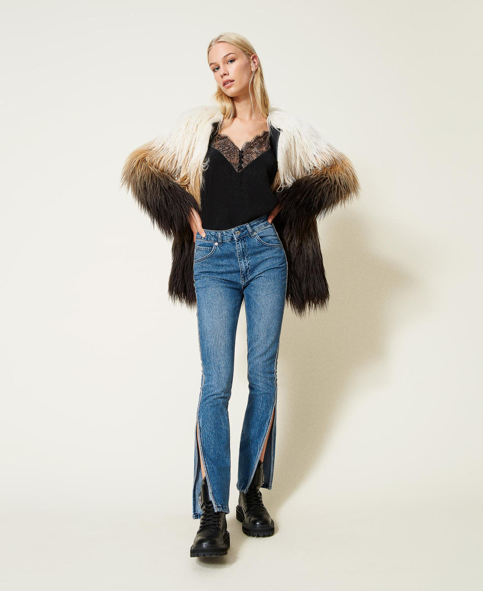 Slim fit jeans with rhinestones and slits