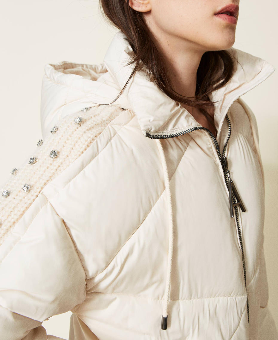 Puffer jacket with embroidered knit inserts