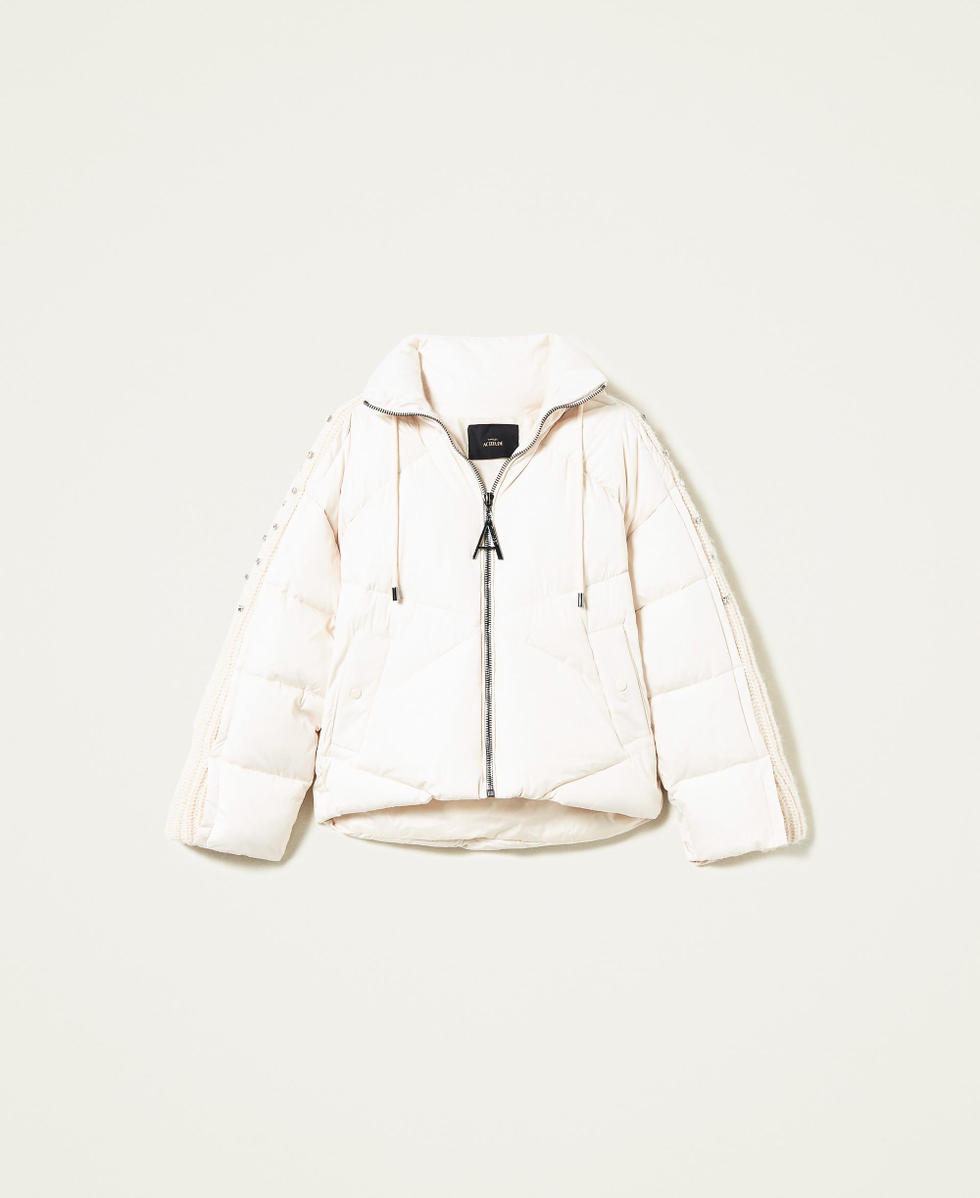 Puffer jacket with embroidered knit inserts