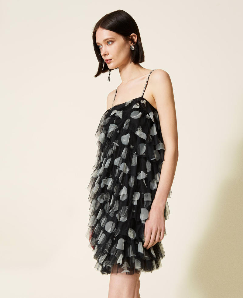 Abito in tulle a pois con balze