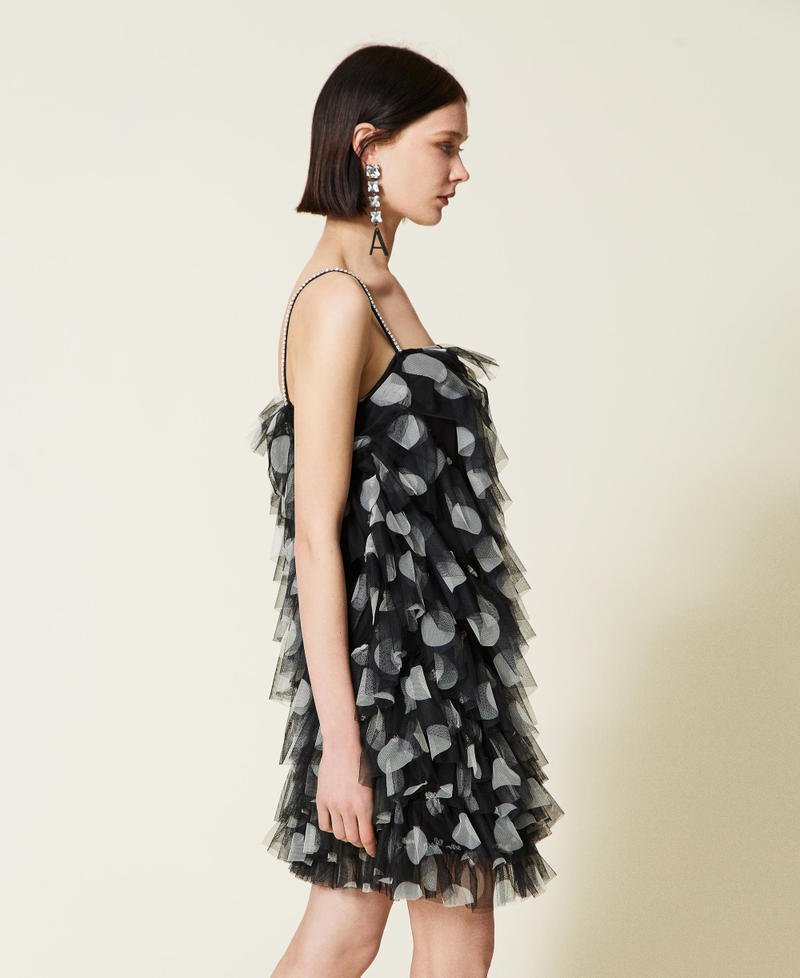 Abito in tulle a pois con balze