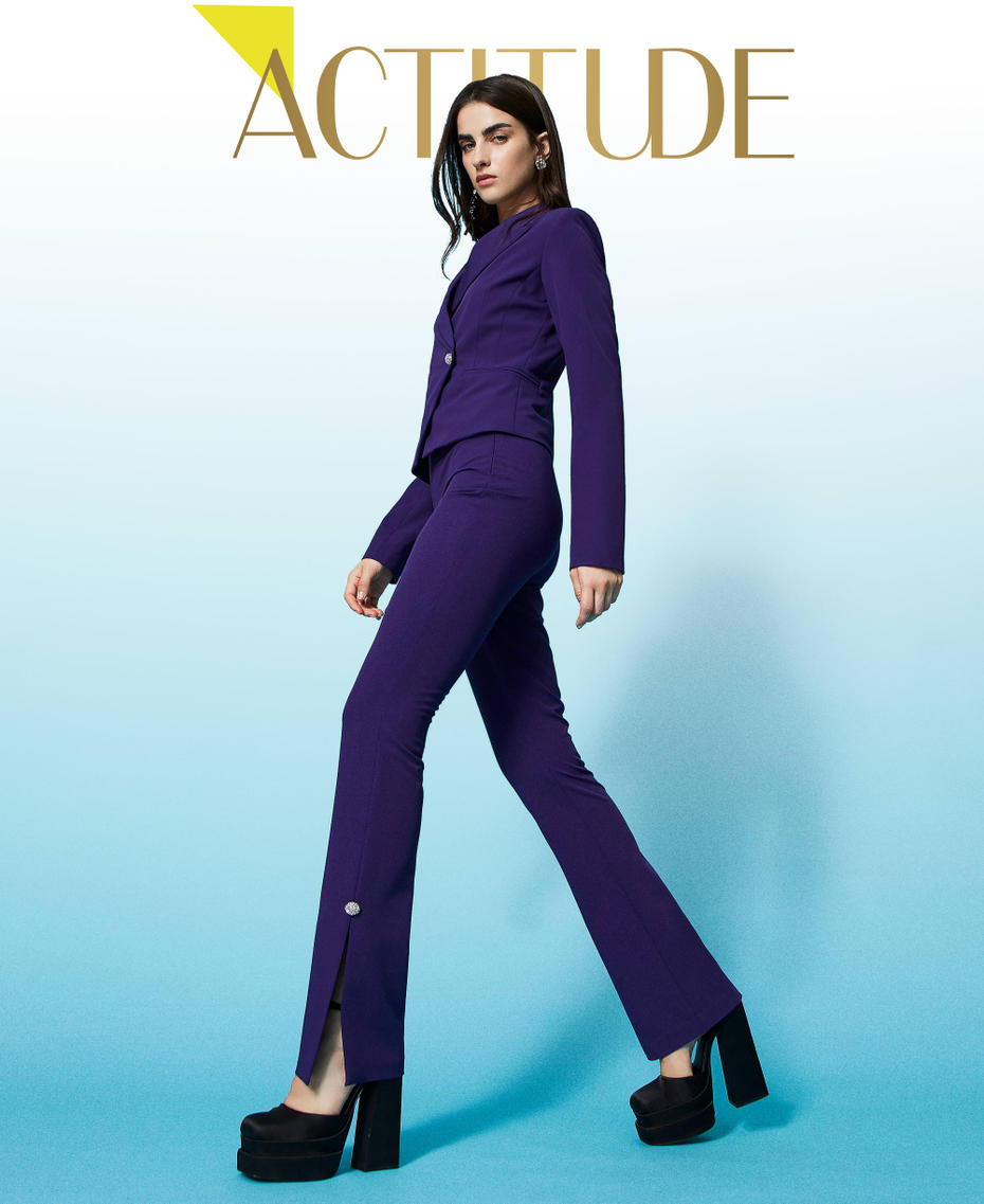 Flared flannel trousers with jewel buttons
