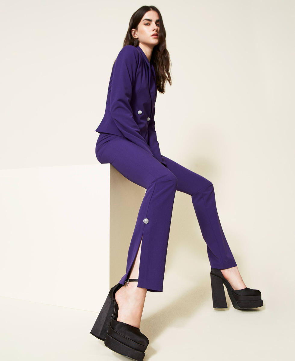 Pantaloni flare in flanella con bottoni gioiello
