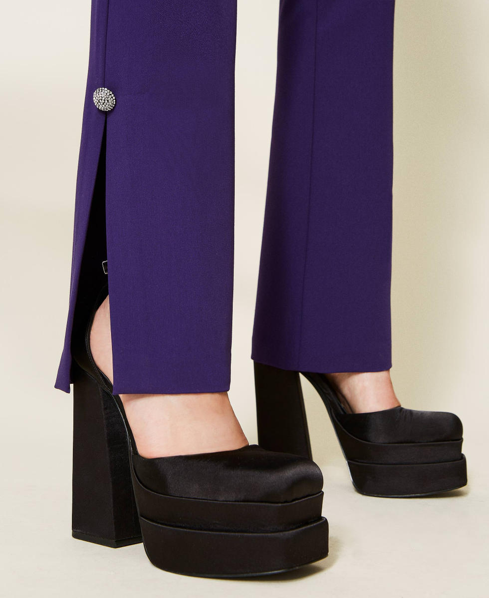 Pantaloni flare in flanella con bottoni gioiello