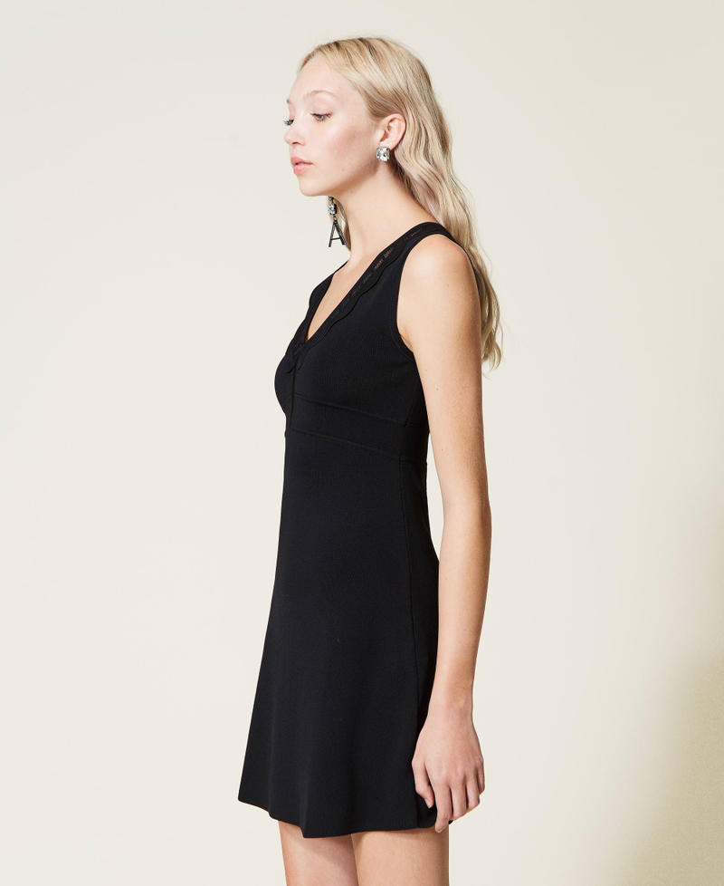 Abito in maglia con punti traforati