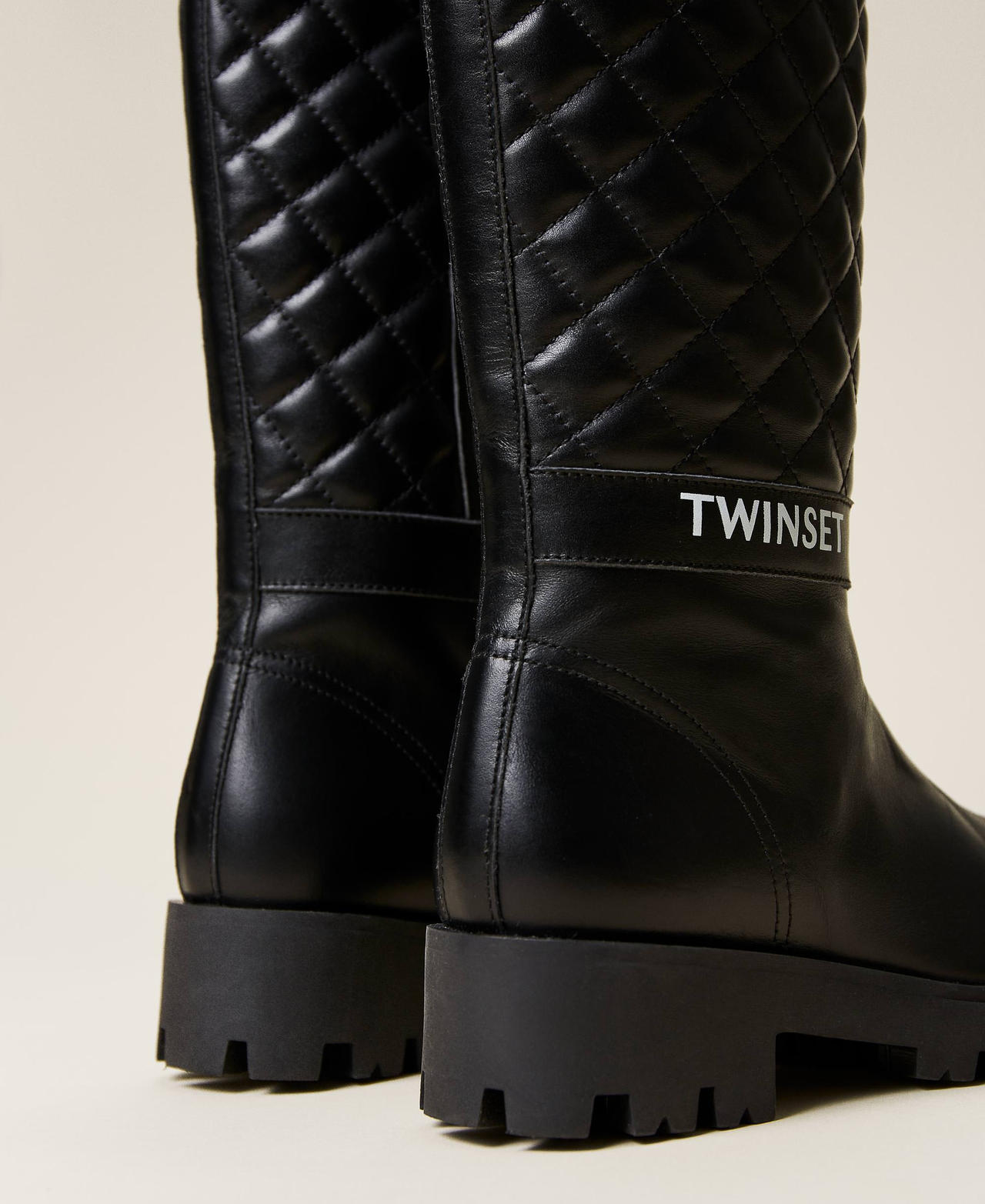 Matelass&eacute; leather boots