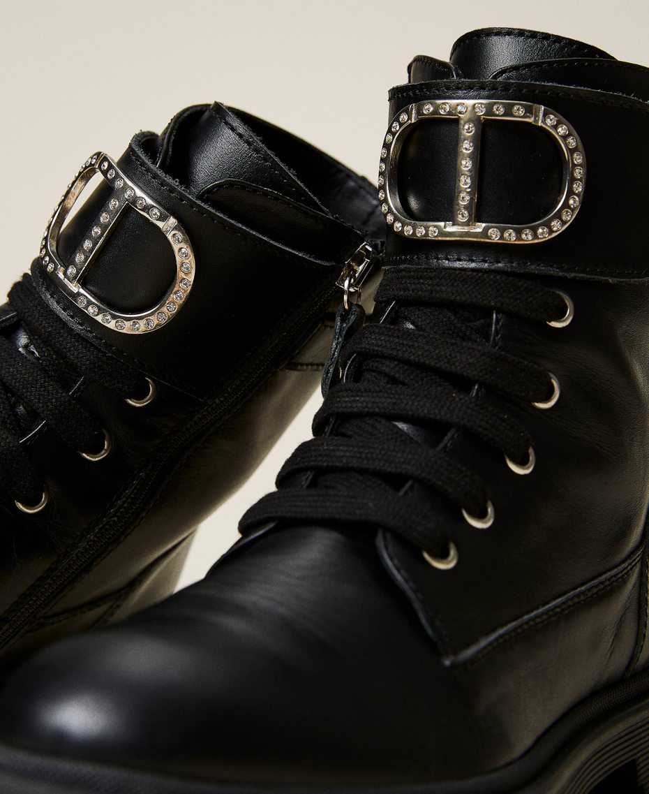 Leather combat boots with logo and strap