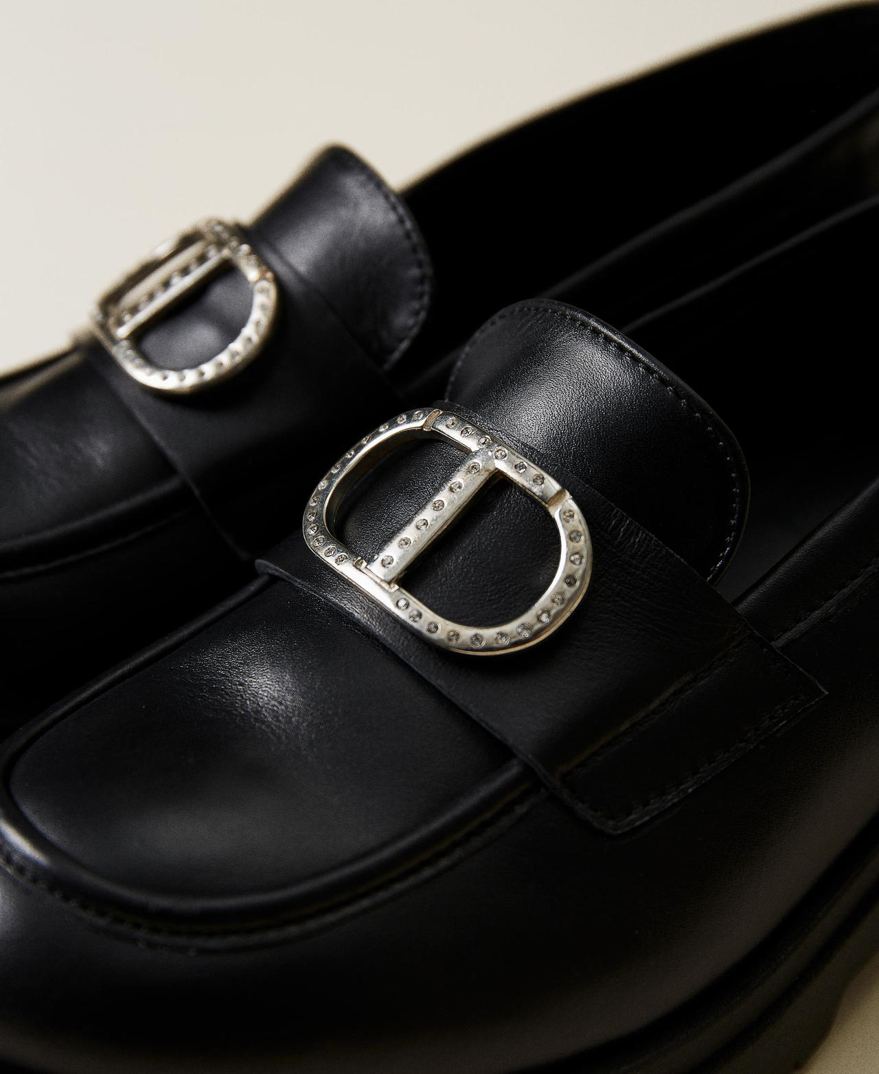 Leather loafers with logo and strap