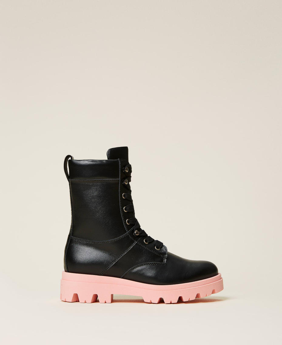 Leather combat boots with contrasting sole