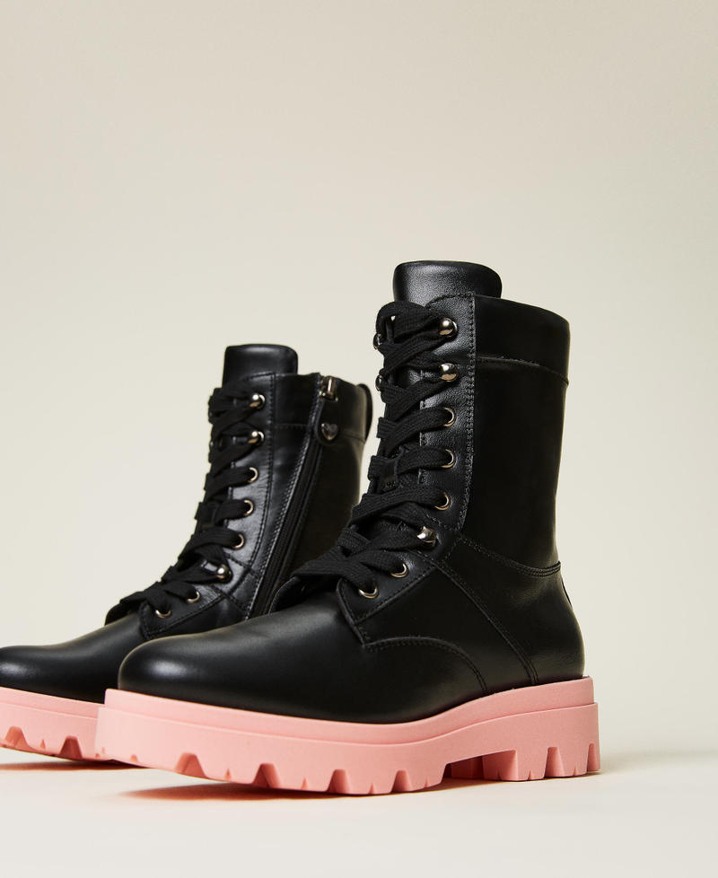 Leather combat boots with contrasting sole