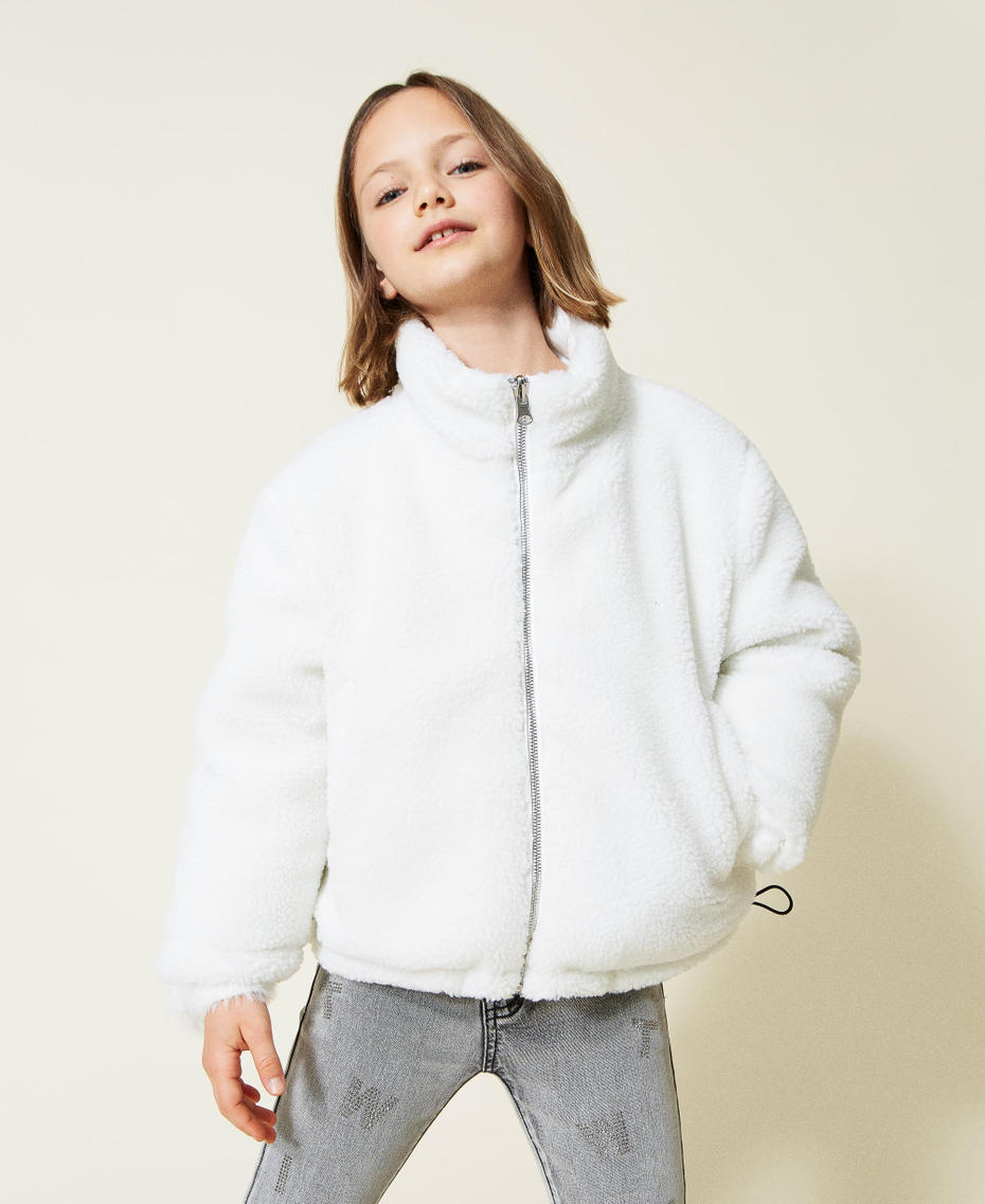Reversible puffer jacket with faux fur