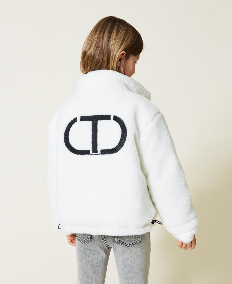 Reversible puffer jacket with faux fur