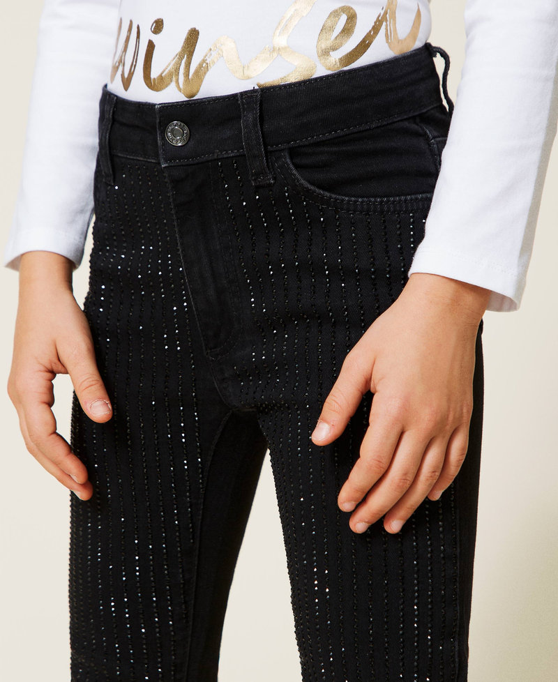 Pantaloni skinny con strass