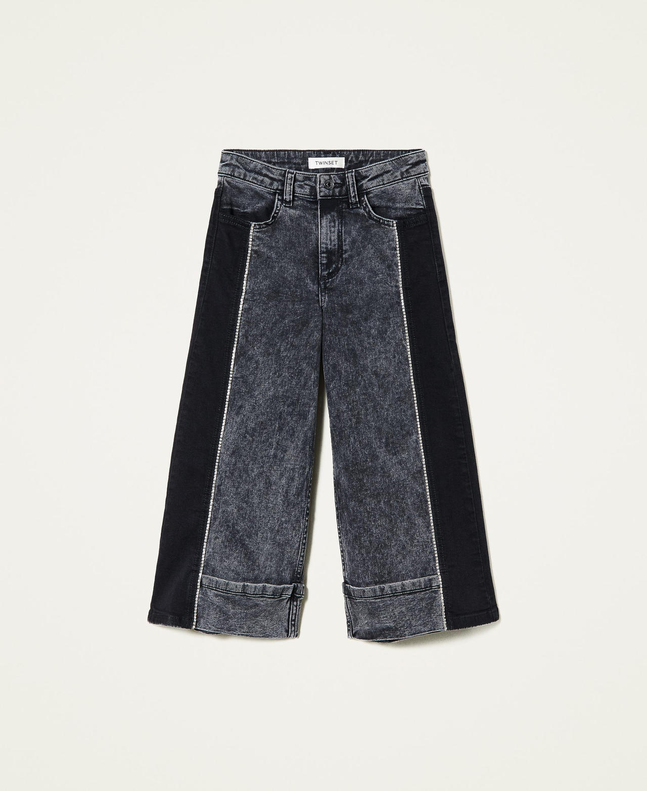 Jeans cropped con catena strass
