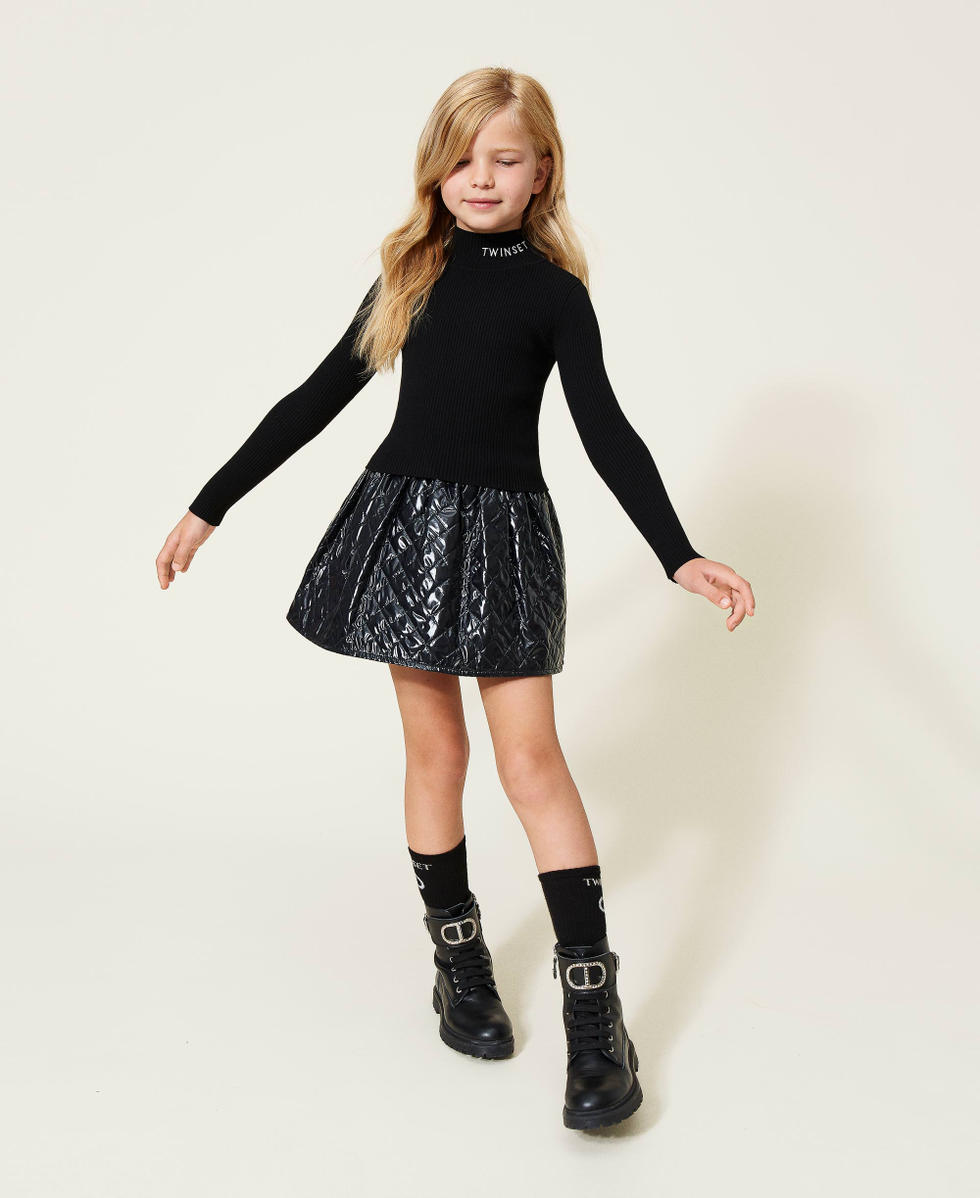 Ribbed turtleneck and diamond-patterned skirt