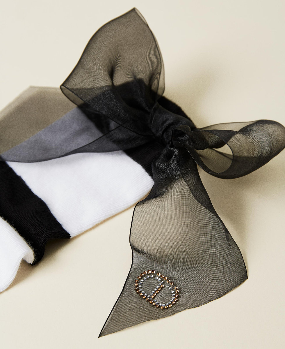 Chaussettes montantes ray&eacute;es avec n&oelig;ud