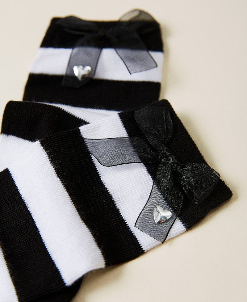 Chaussettes rayées avec nœud Rayures Blanc Cassé / Noir Fille 222GJ4600-02
