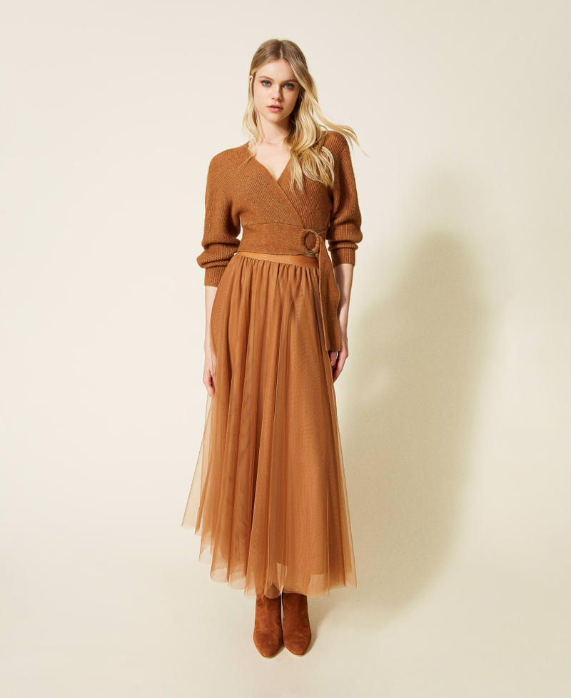 Short cardigan with criss-cross