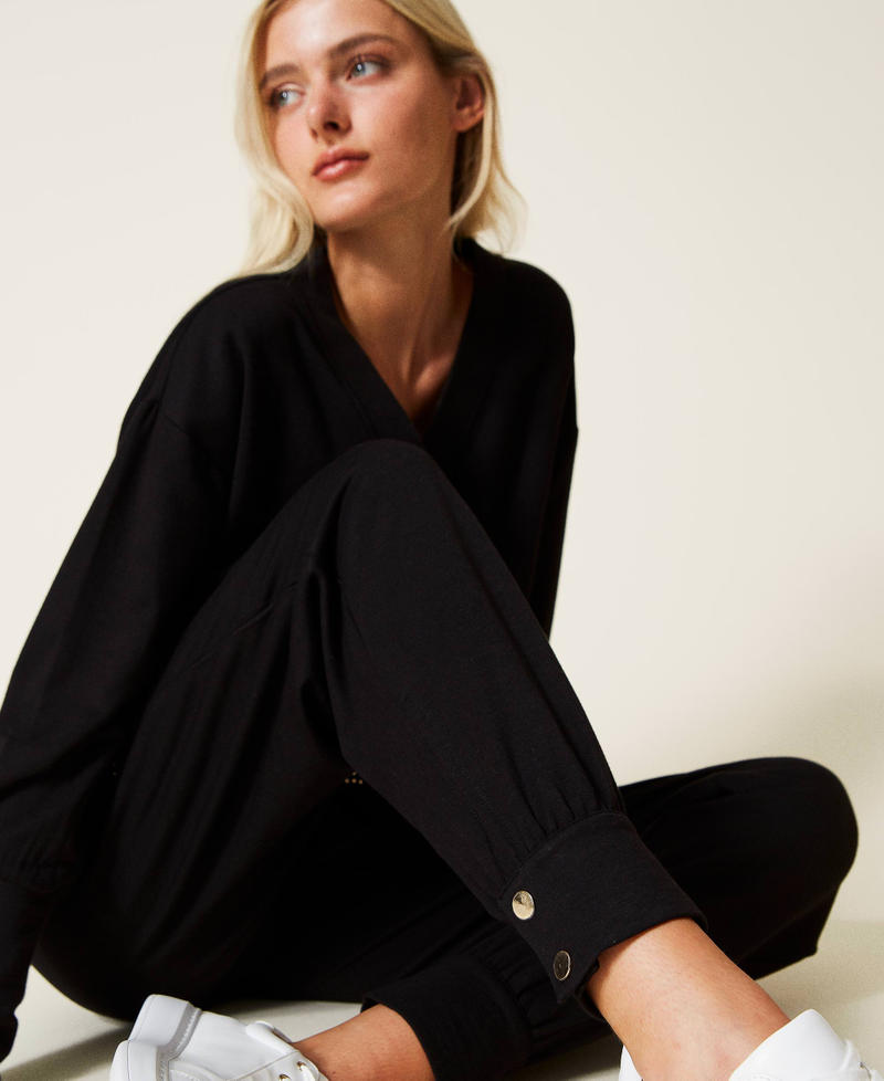 Plush fabric joggers with buttons