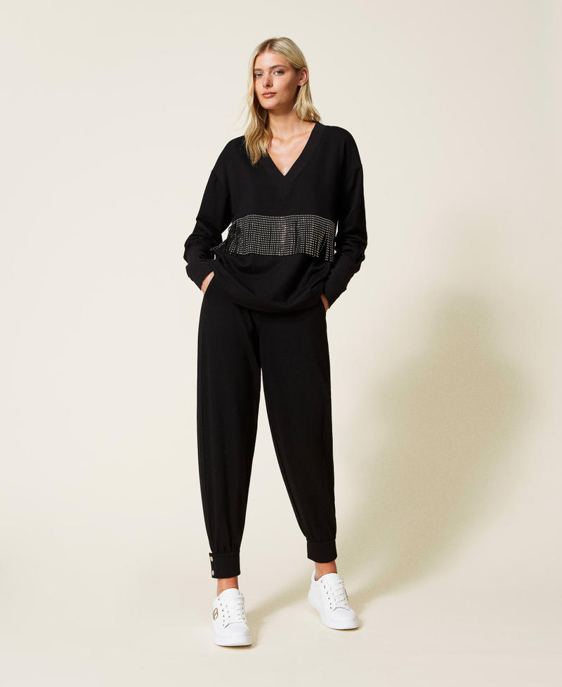 Plush fabric joggers with buttons